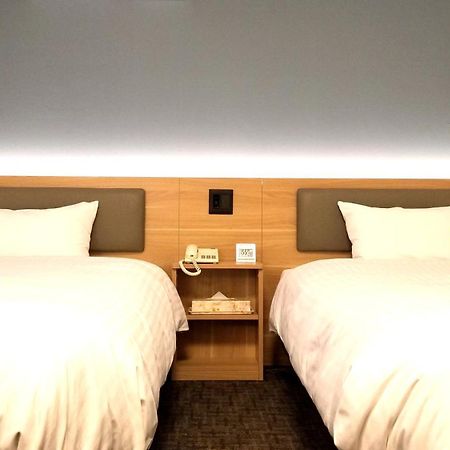 Kochi Sunrise Hotel Bagian luar foto