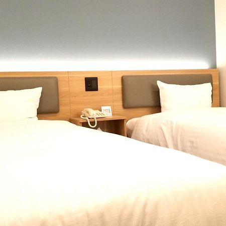 Kochi Sunrise Hotel Bagian luar foto