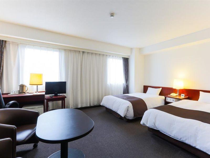 Kochi Sunrise Hotel Bagian luar foto
