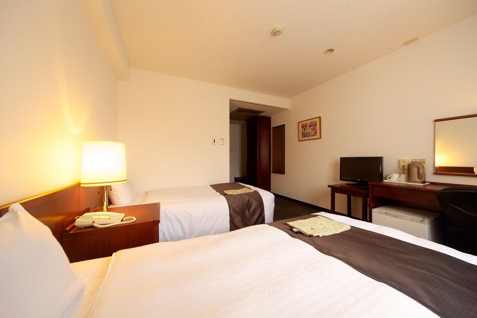 Kochi Sunrise Hotel Bagian luar foto