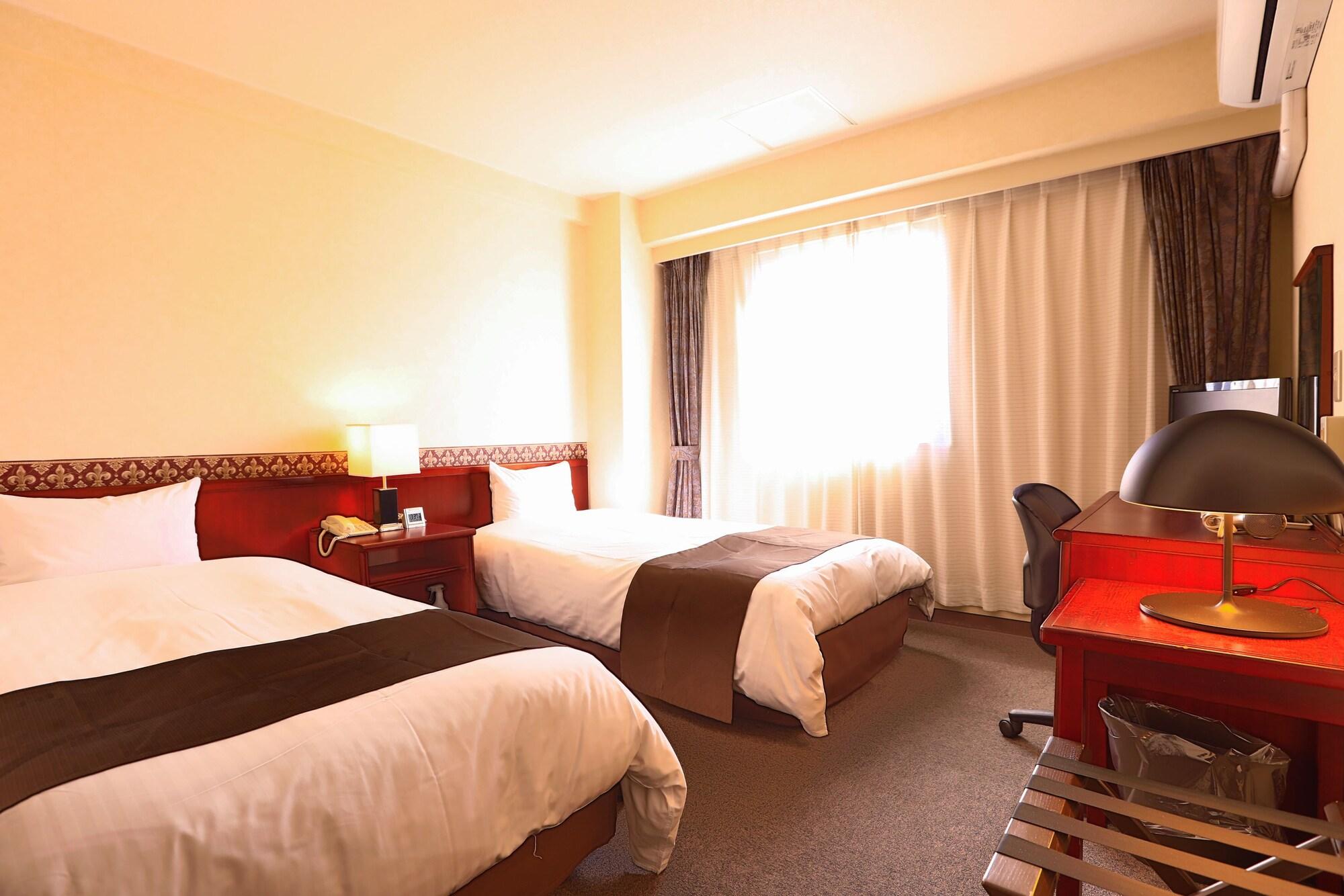 Kochi Sunrise Hotel Bagian luar foto