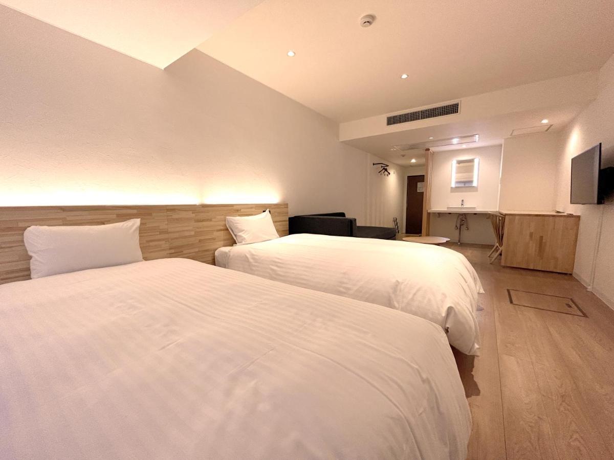 Kochi Sunrise Hotel Bagian luar foto