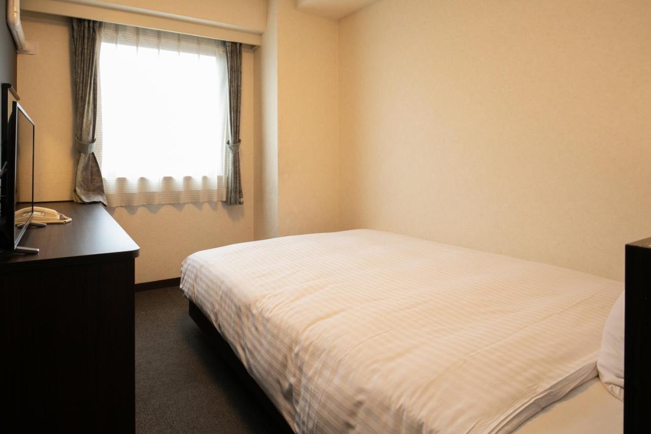 Kochi Sunrise Hotel Bagian luar foto