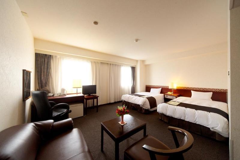 Kochi Sunrise Hotel Bagian luar foto