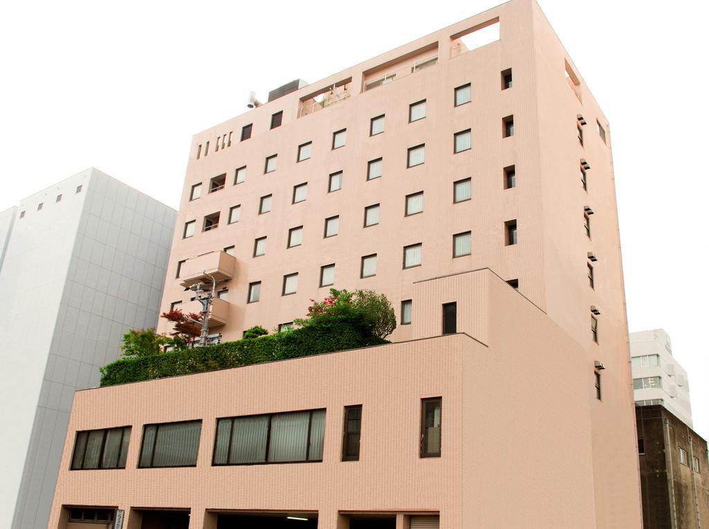 Kochi Sunrise Hotel Bagian luar foto