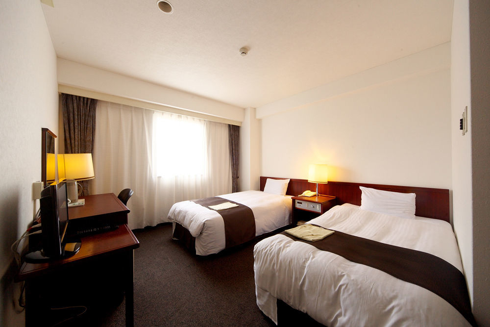 Kochi Sunrise Hotel Bagian luar foto